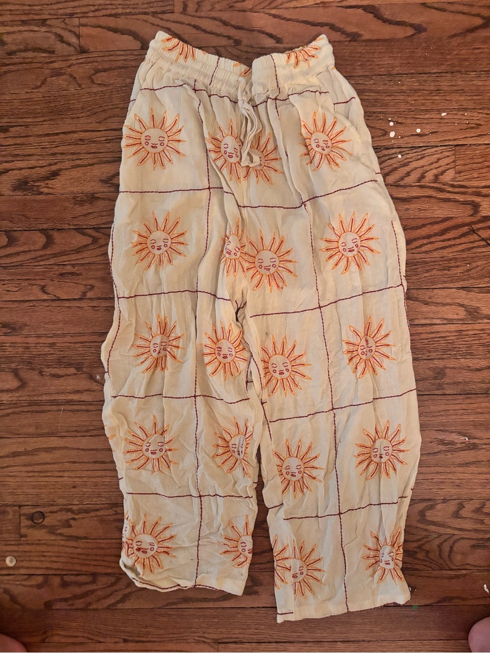 Urban Outfitters Cream Pants with Orange Sun Embroidery